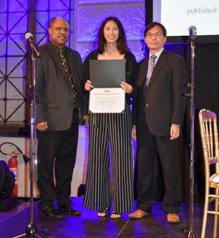 Samantha Sun receives her award for the IEEE Brain Best Student Paper. From left to right: Edward Tunsel (Motiv Space Systems, Inc.), Samantha Sun, Sam Kwong (City University of Hong Kong) Samantha Sun receives award