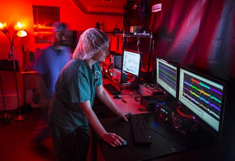 A women working with neuroscience equipment