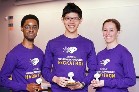2019 CNT Hackathon winners, Team RISE, pose with their trophies in-hand.