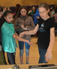 Student participating in CSNE's exhibit at the Brain Awareness Open House