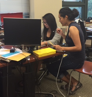 Larissa Ho (left) works with Nile Wilson, PhD student at UW