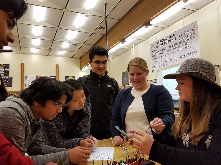 Alexandra Pike with students at Juanita High School