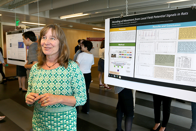 RET participant, Laura Moore, with her research poster at the CSNE