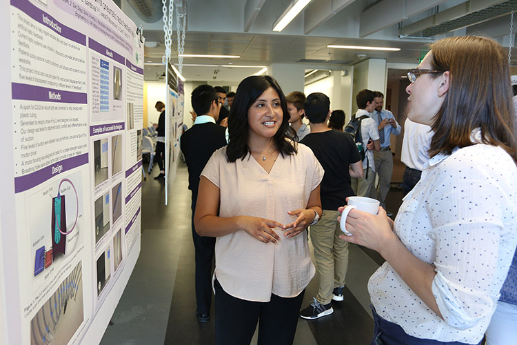 REV participant, Laura Sandoval, answering questions about her research project presentation at the CSNE