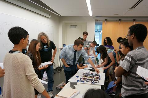 Benjamin Hart demonstrating an artificial neural network to students at the CNT